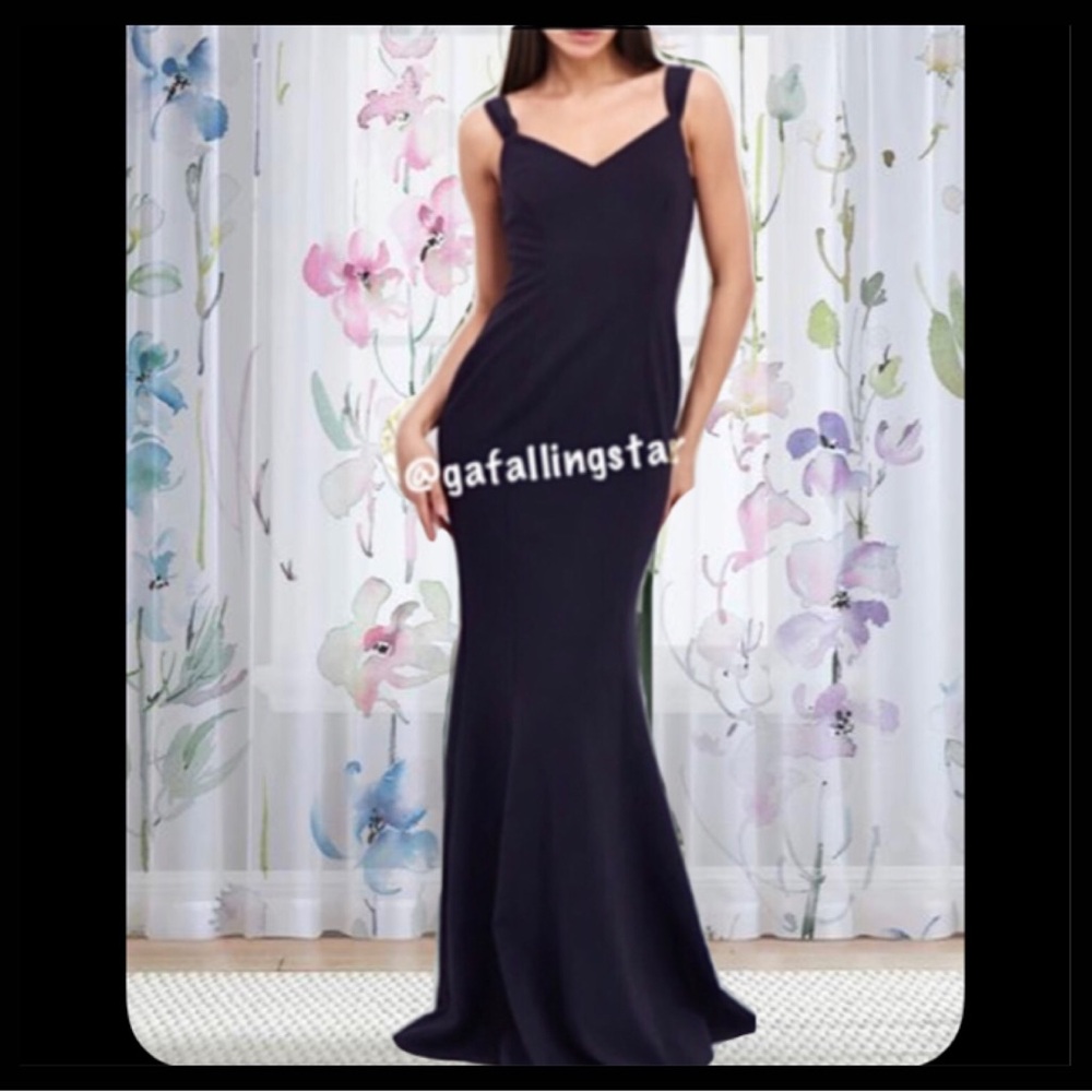 Likely formal cap sleeve mermaid gown